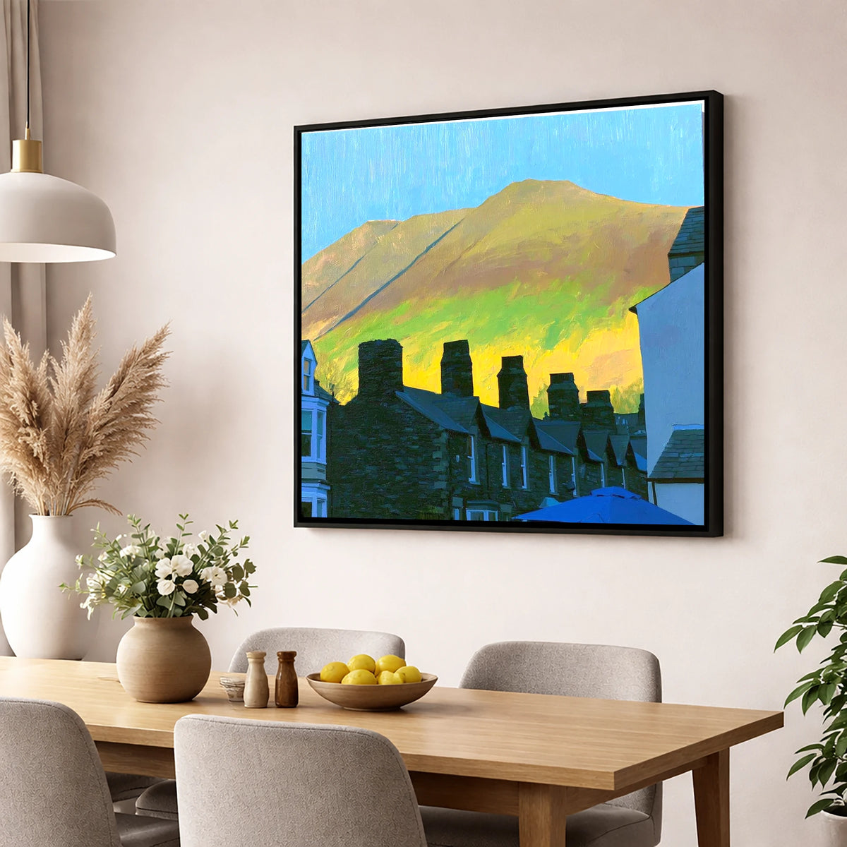 Keswick Chimneys and Sunlit Skiddaw lake district village wall art displayed in a dining room