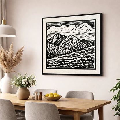 Monochrome Rolling Fells Under Cloud lake district fell wall art displayed in a dining room
