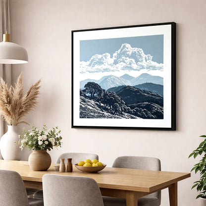Rolling Fells Beneath Towering Clouds lake district fell wall art displayed in a dining room