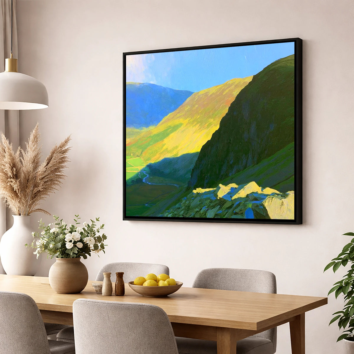 Sunlit Tarn Crag and Valley lake district fell wall art displayed in a dining room