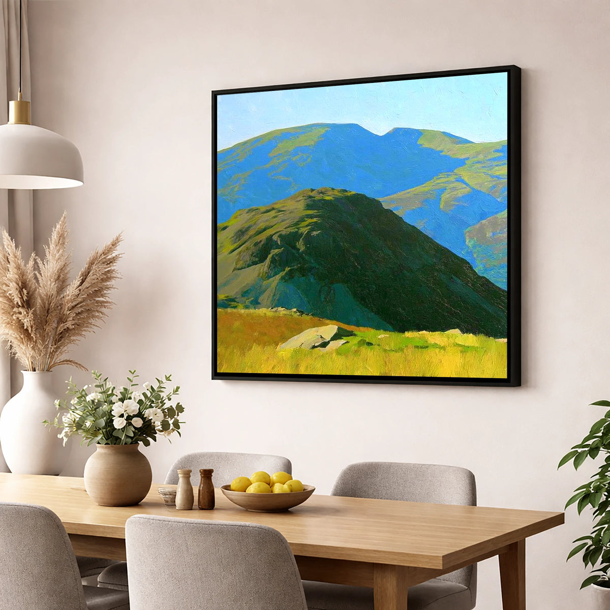 Vibrant Hard Knott and Blue Peaks lake district fell wall art displayed in a dining room