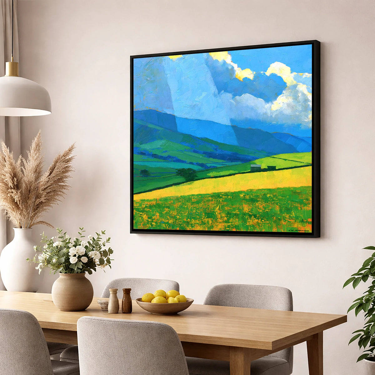 Sunlit Yellow Fields and Stormy Fells lake district sky wall art displayed in a dining room
