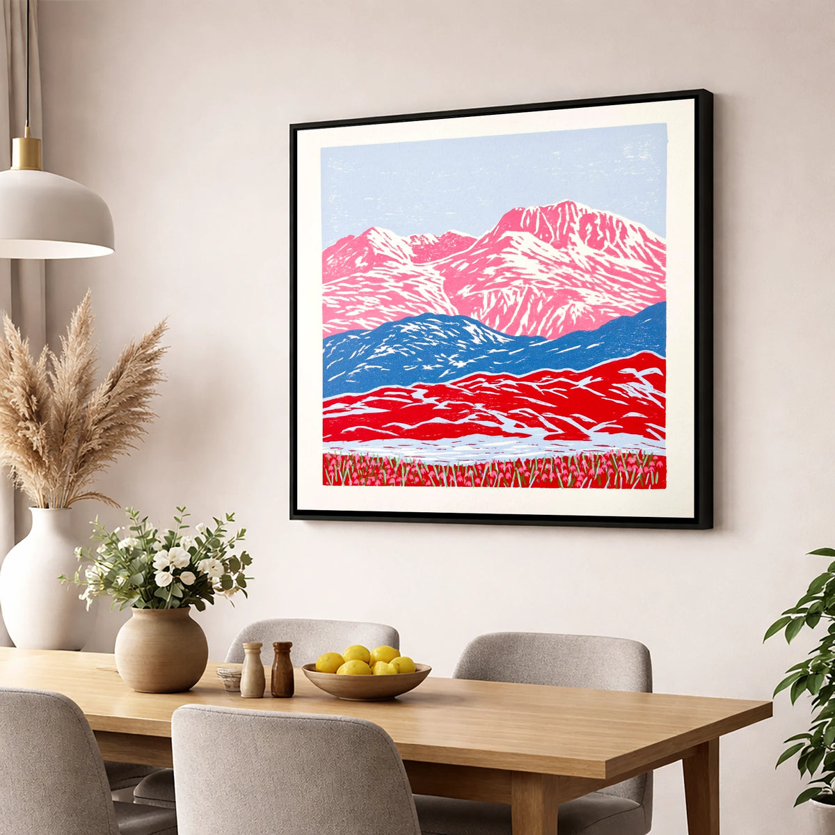 Bowfell in Bold Pink and Blue lake district fell wall art displayed in a dining room