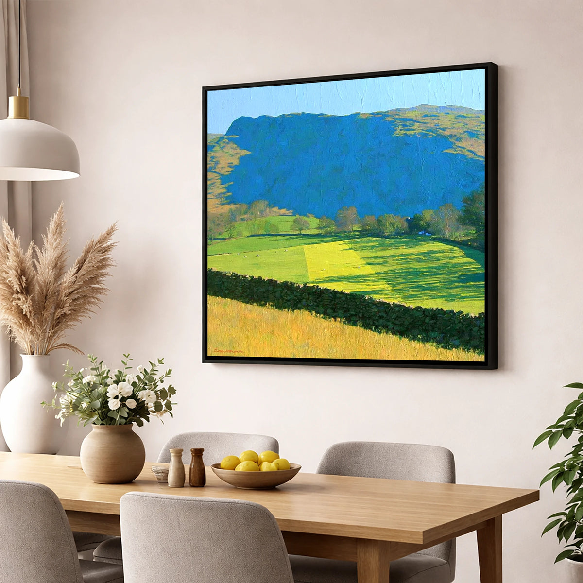 Sunlit Fields Below Troutbeck Tongue lake district fell wall art displayed in a dining room
