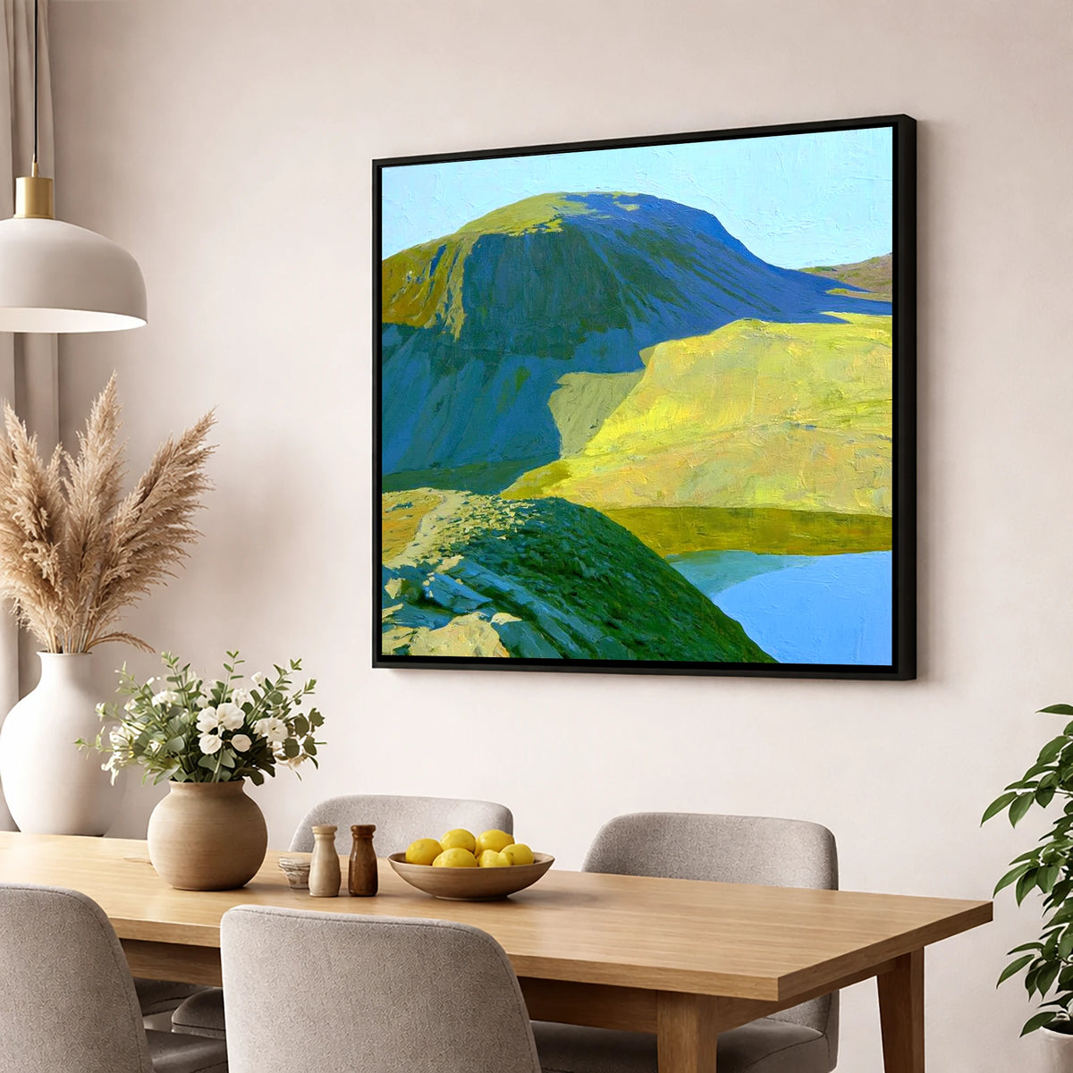 Vibrant Green Gable and Tarn lake district fell wall art displayed in a dining room