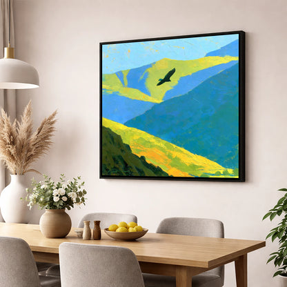 Soaring Bird of Prey Over Sunlit Fells lake district wildlife wall art displayed in a dining room