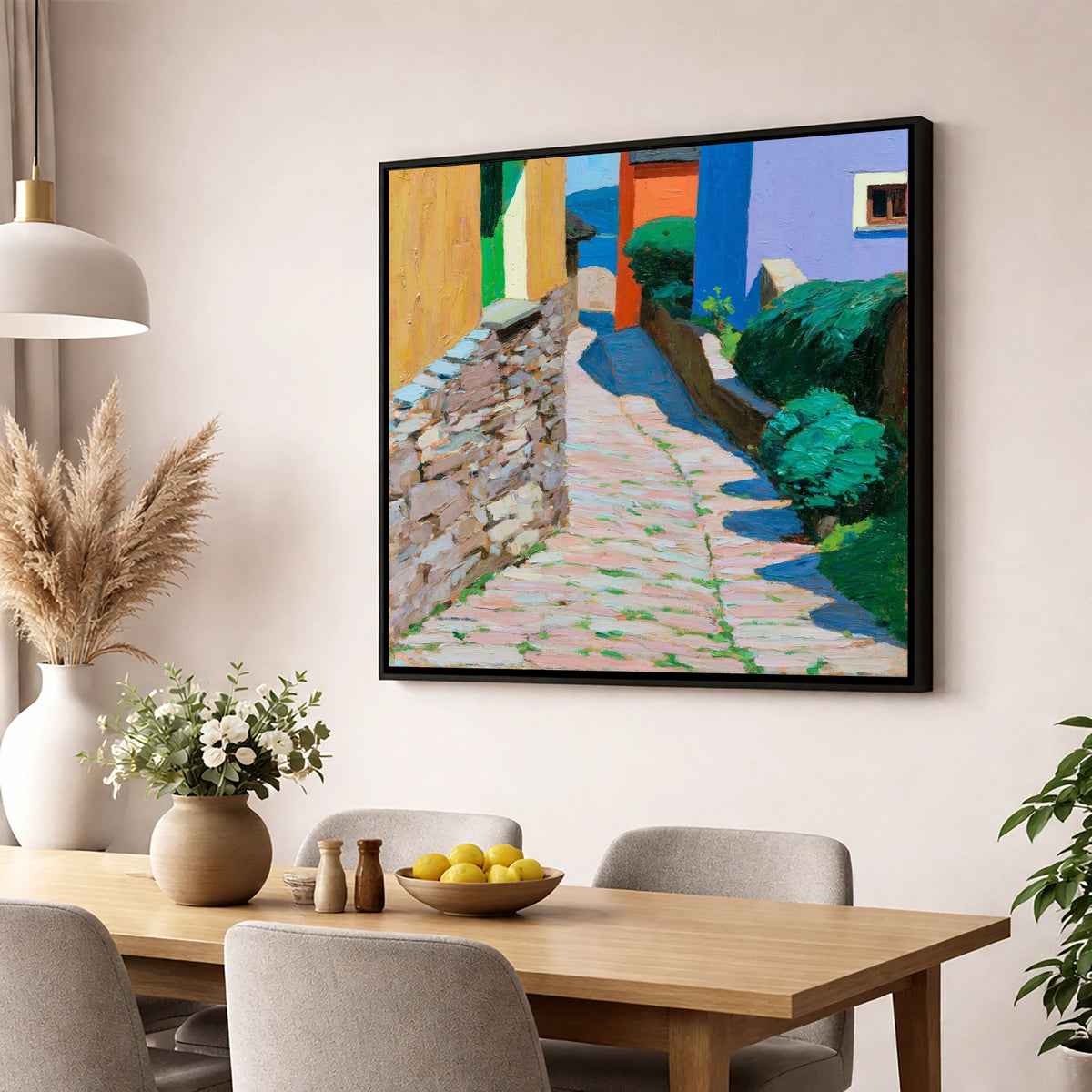 Colourful Cobbled Village Street lake district village wall art displayed in a dining room