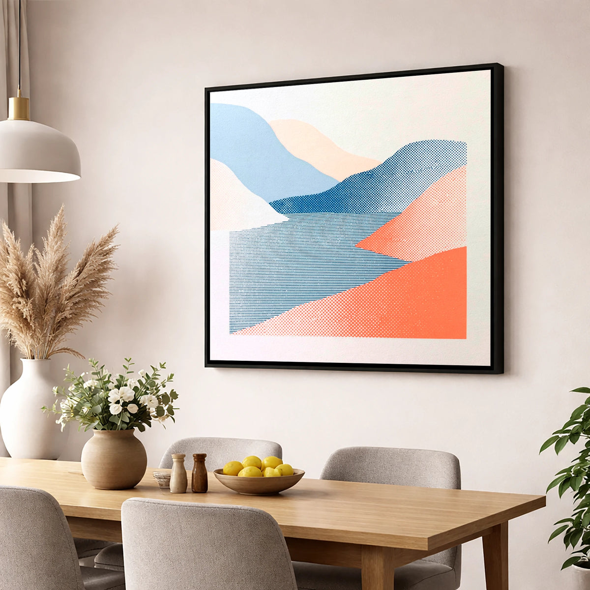 Graphic Coral and Blue Fells lake district lake wall art displayed in a dining room