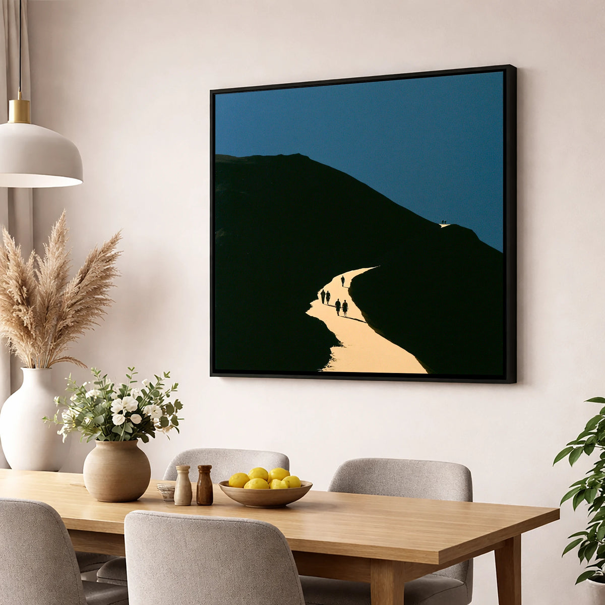 Walkers Ascending Luminous Fell Path lake district walking wall art displayed in a dining room