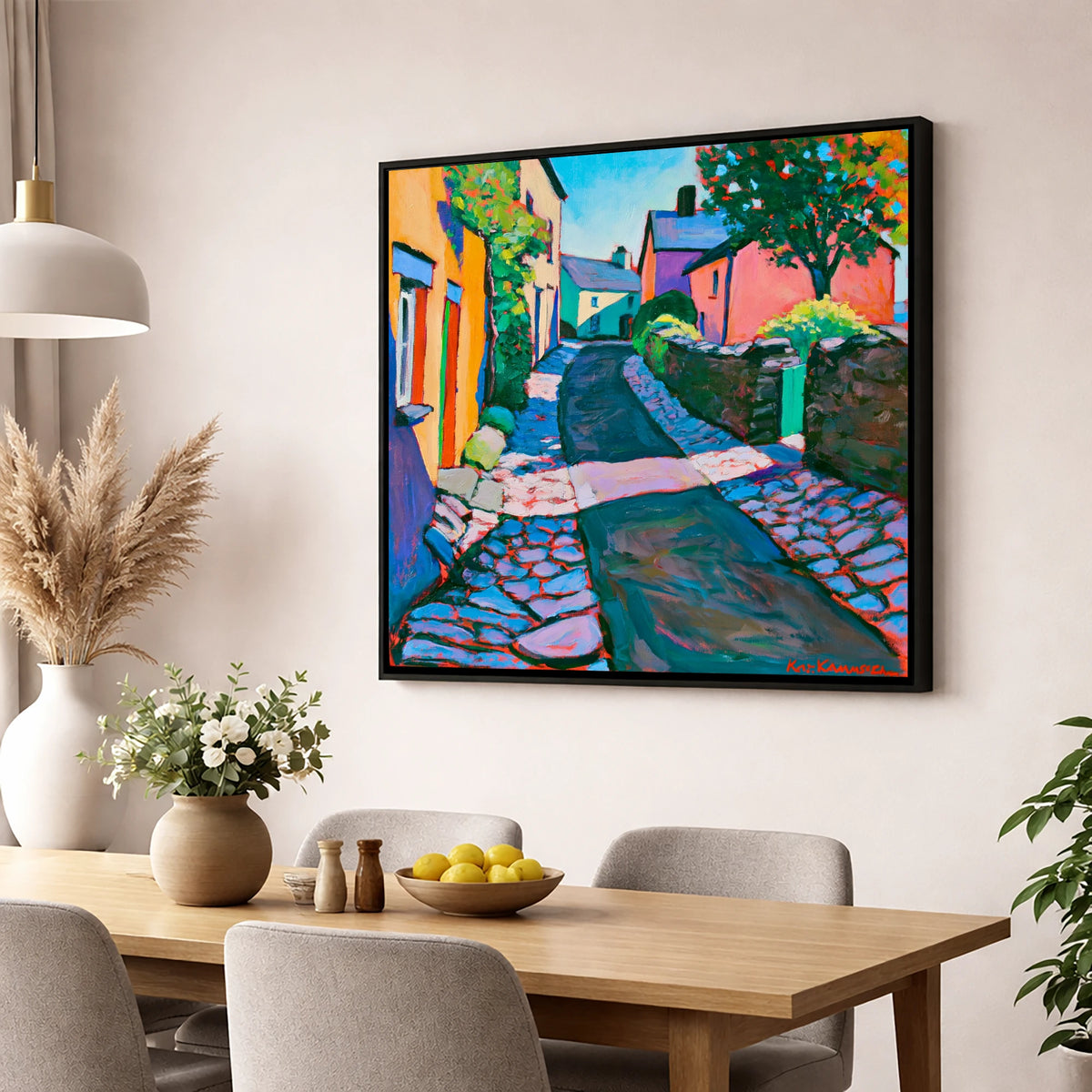 Vibrant Cobbled Village Street lake district village wall art displayed in a dining room