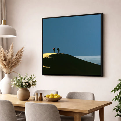 Silhouetted Hikers on a Fell Top lake district fell wall art displayed in a dining room