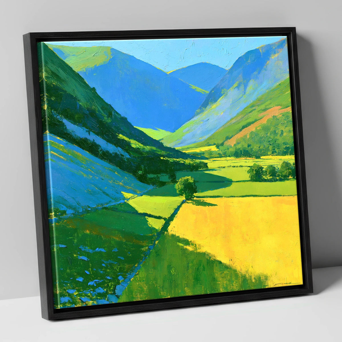 Vibrant Sunlit Valley with Blue Fellside Shadows lake district valley canvas wall art in black frame