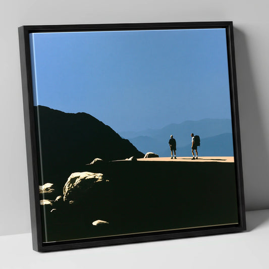Hikers on a Sunlit Fell Ridge lake district fell canvas wall art in black frame
