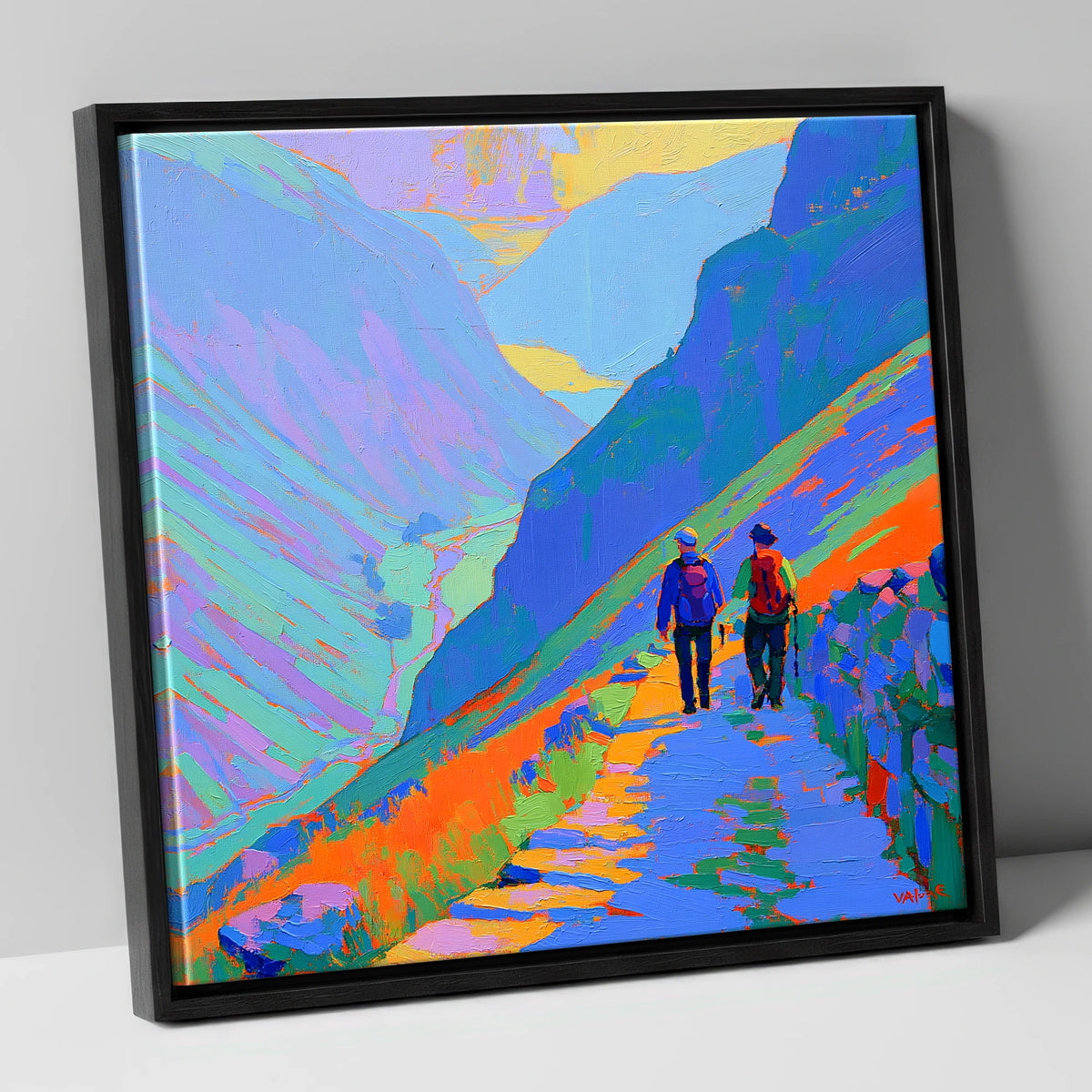 Walkers on a Colourful Mountain Path lake district walking canvas wall art in black frame