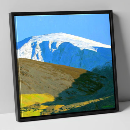 Sunlight on Snow Capped Raise lake district fell canvas wall art in black frame