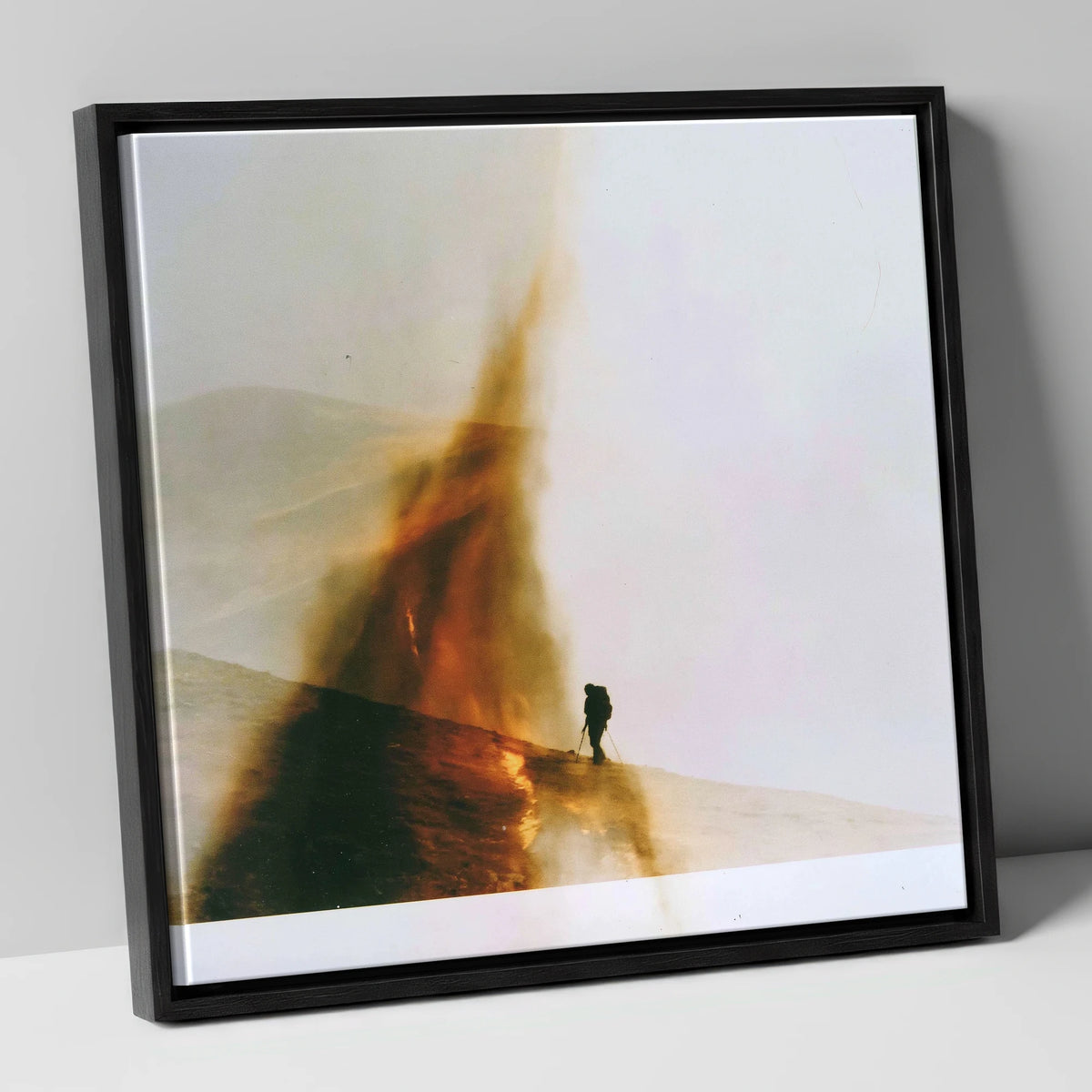 Fell-walker Silhouette in Amber Mist lake district walking canvas wall art in black frame