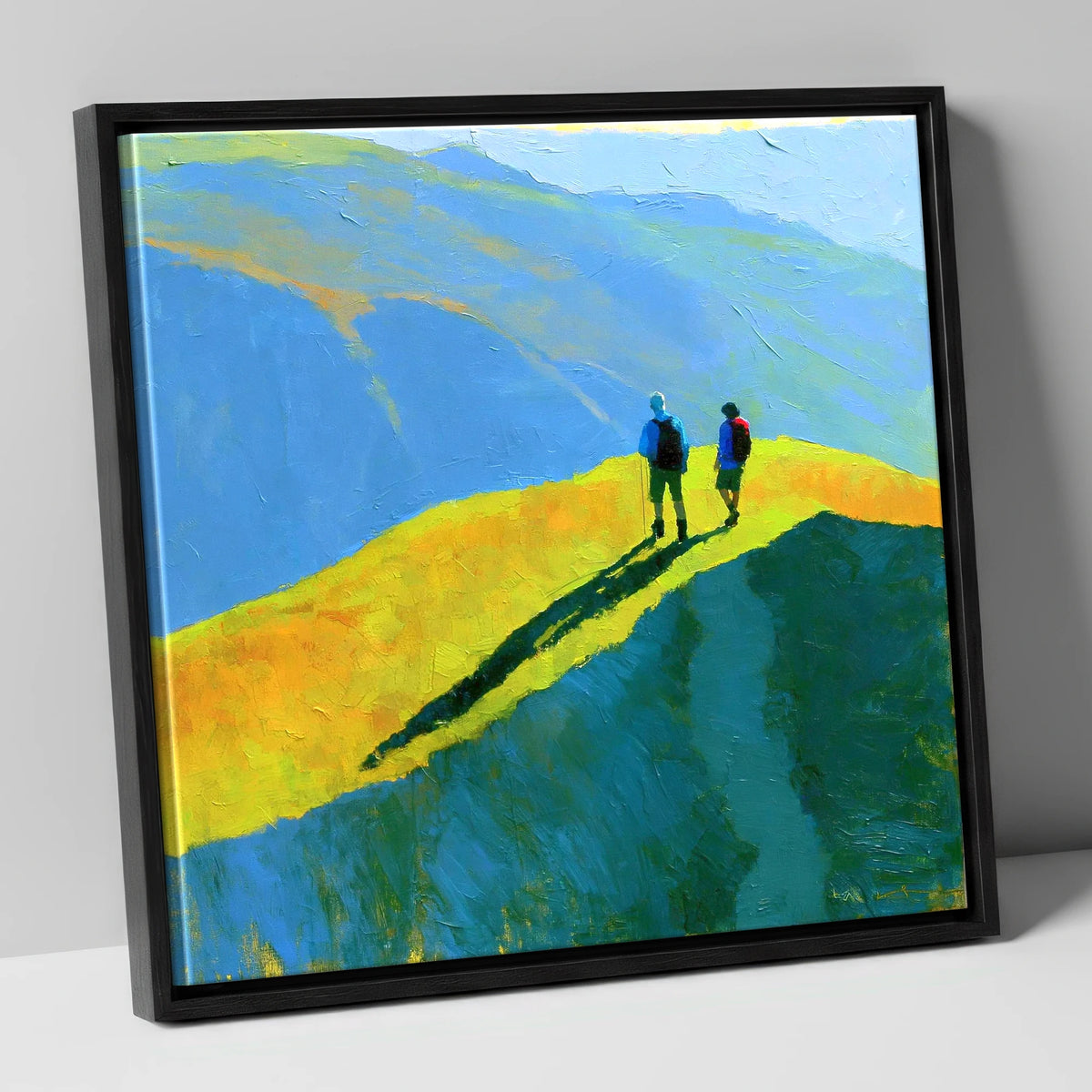 Fell Walkers on a Vibrant Sunlit Ridge lake district fell canvas wall art in black frame