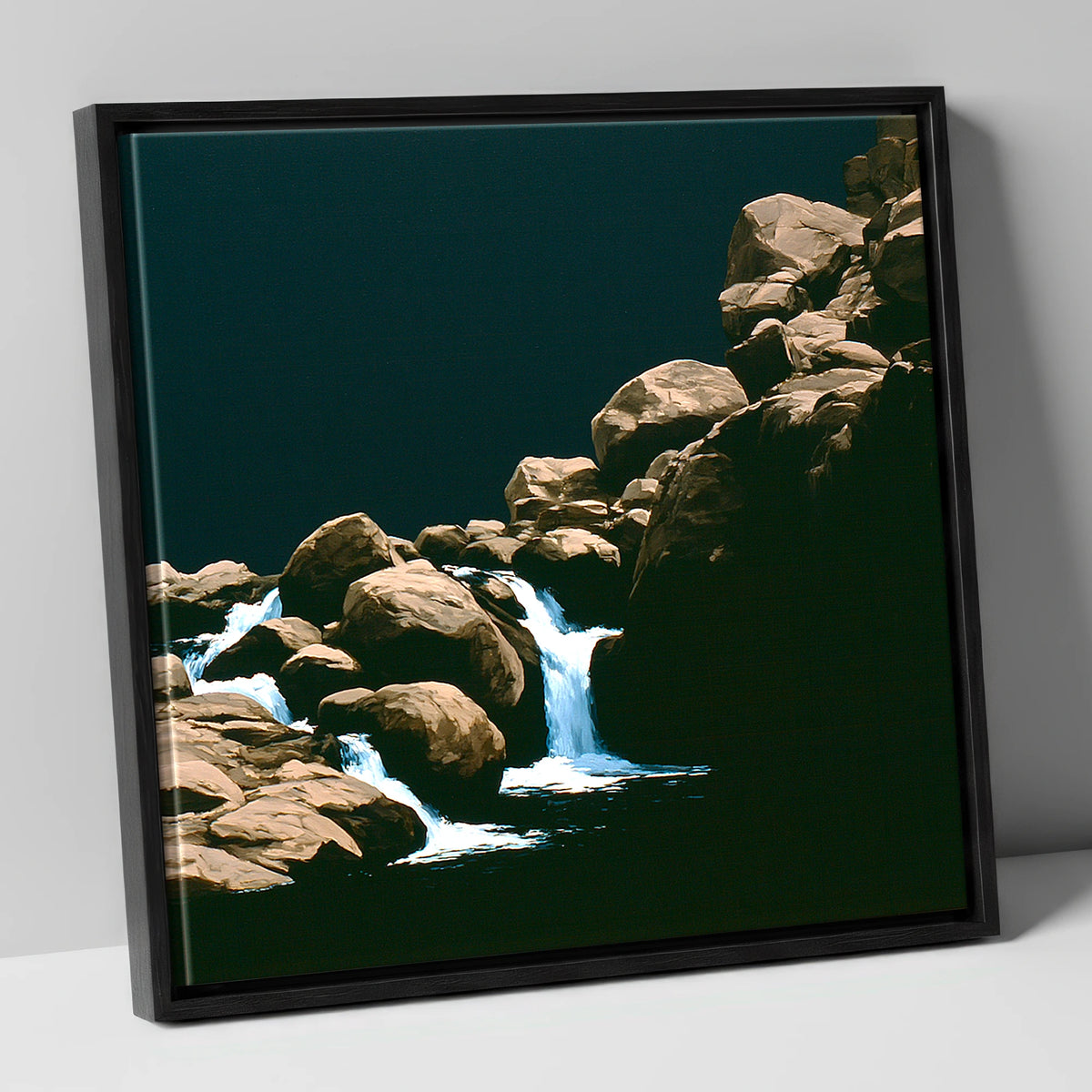 Tumbling Waterfall Among Sunlit Boulders lake district waterfall canvas wall art in black frame