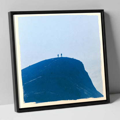 Hikers on a Blue Fell Top lake district fell canvas wall art in black frame