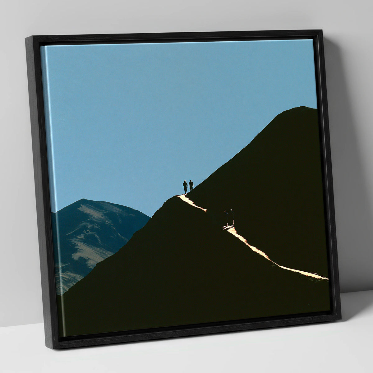 Walkers on a Sunlit Mountain Path lake district walking canvas wall art in black frame