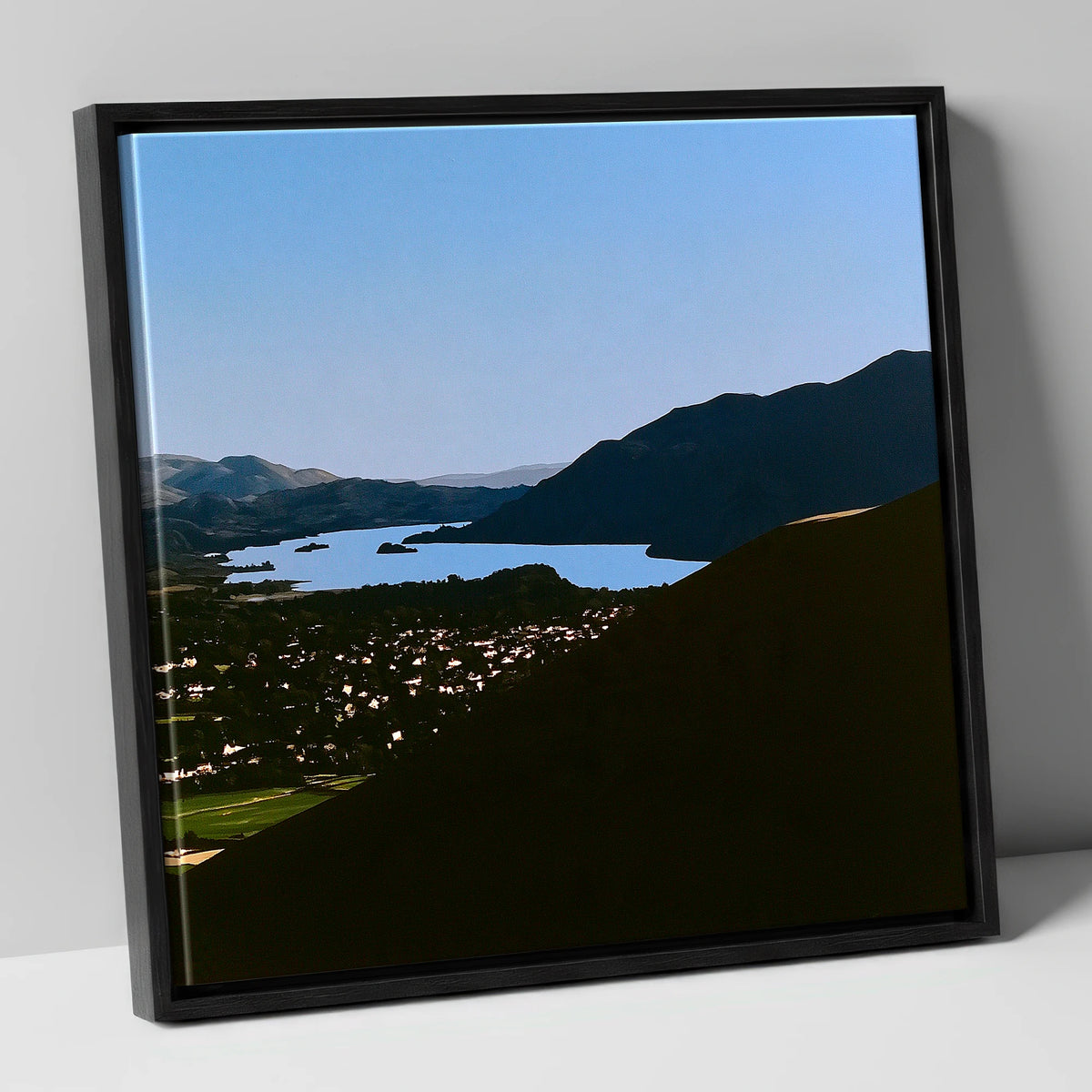Keswick and Derwentwater in Silhouette lake district village canvas wall art in black frame