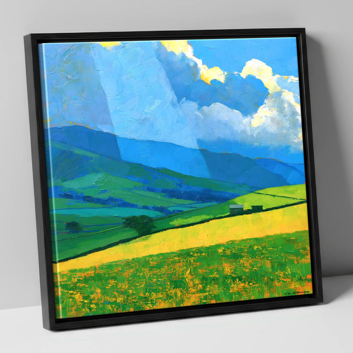 Sunlit Yellow Fields and Stormy Fells lake district sky canvas wall art in black frame