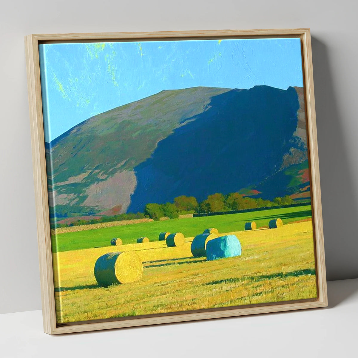 Blencathra Above Sunlit Hay Bales lake district fell canvas wall art in natural frame