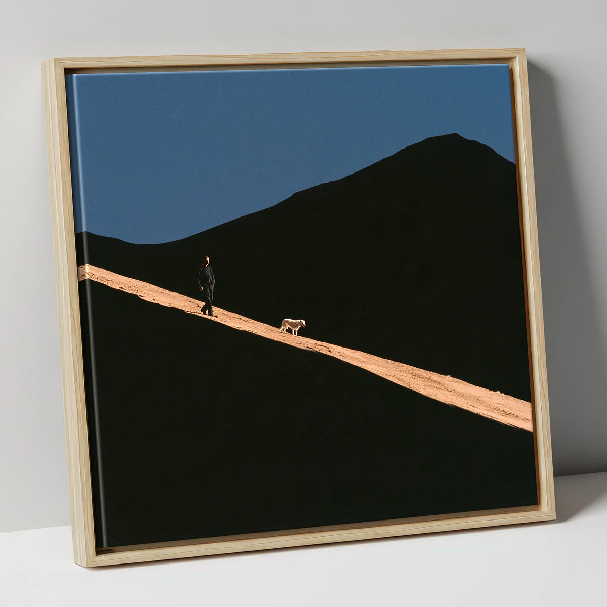 Dog Walker on Sunlit Skiddaw gifts for dog walkers canvas wall art in natural frame