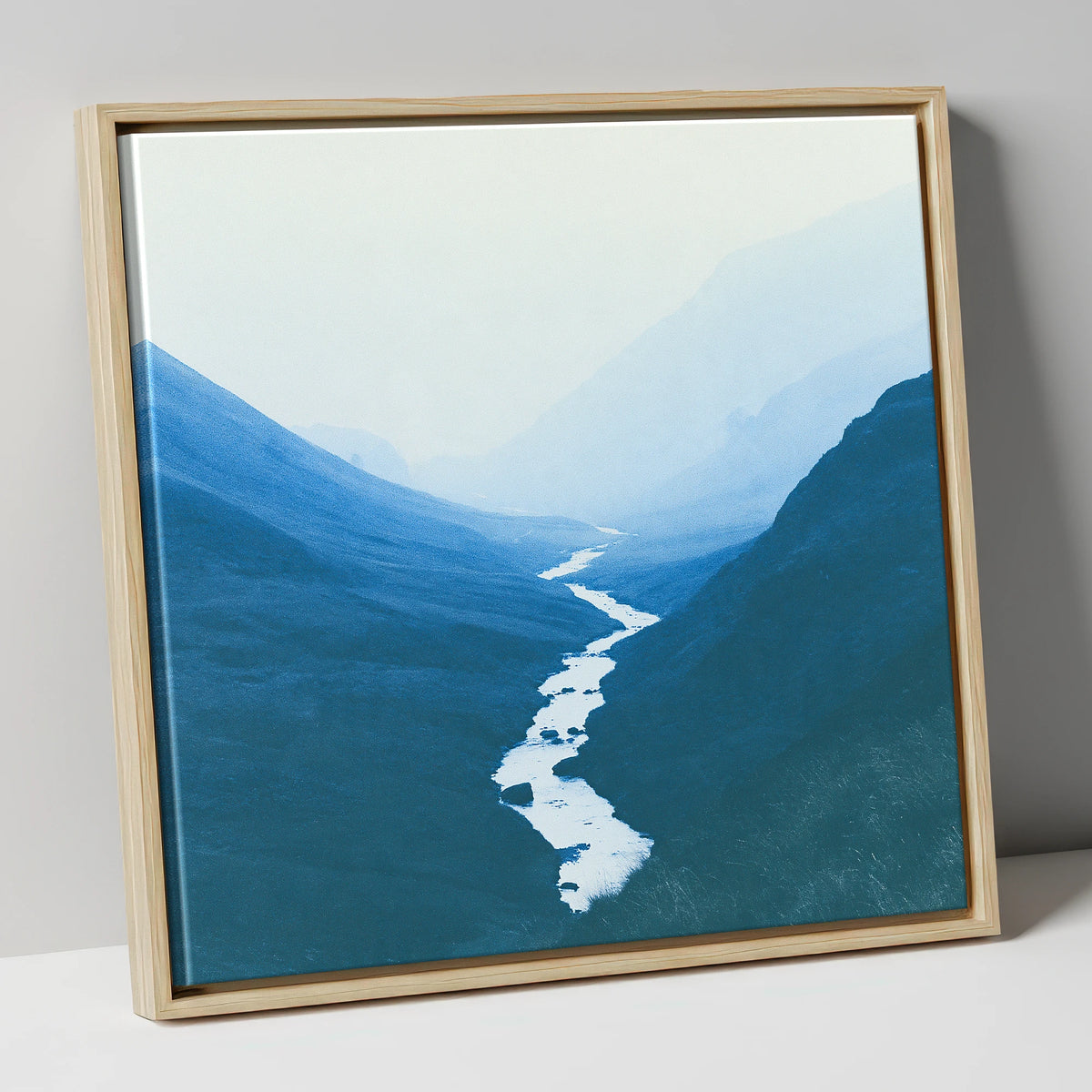 River Winding Through Blue Fells lake district waterfall canvas wall art in natural frame