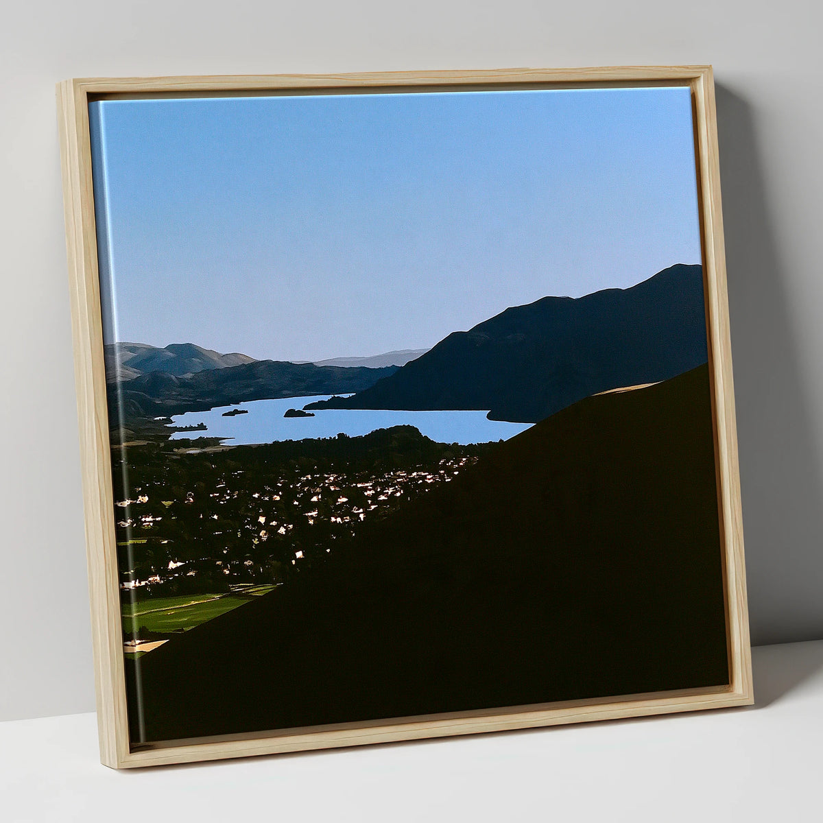 Keswick and Derwentwater in Silhouette lake district village canvas wall art in natural frame