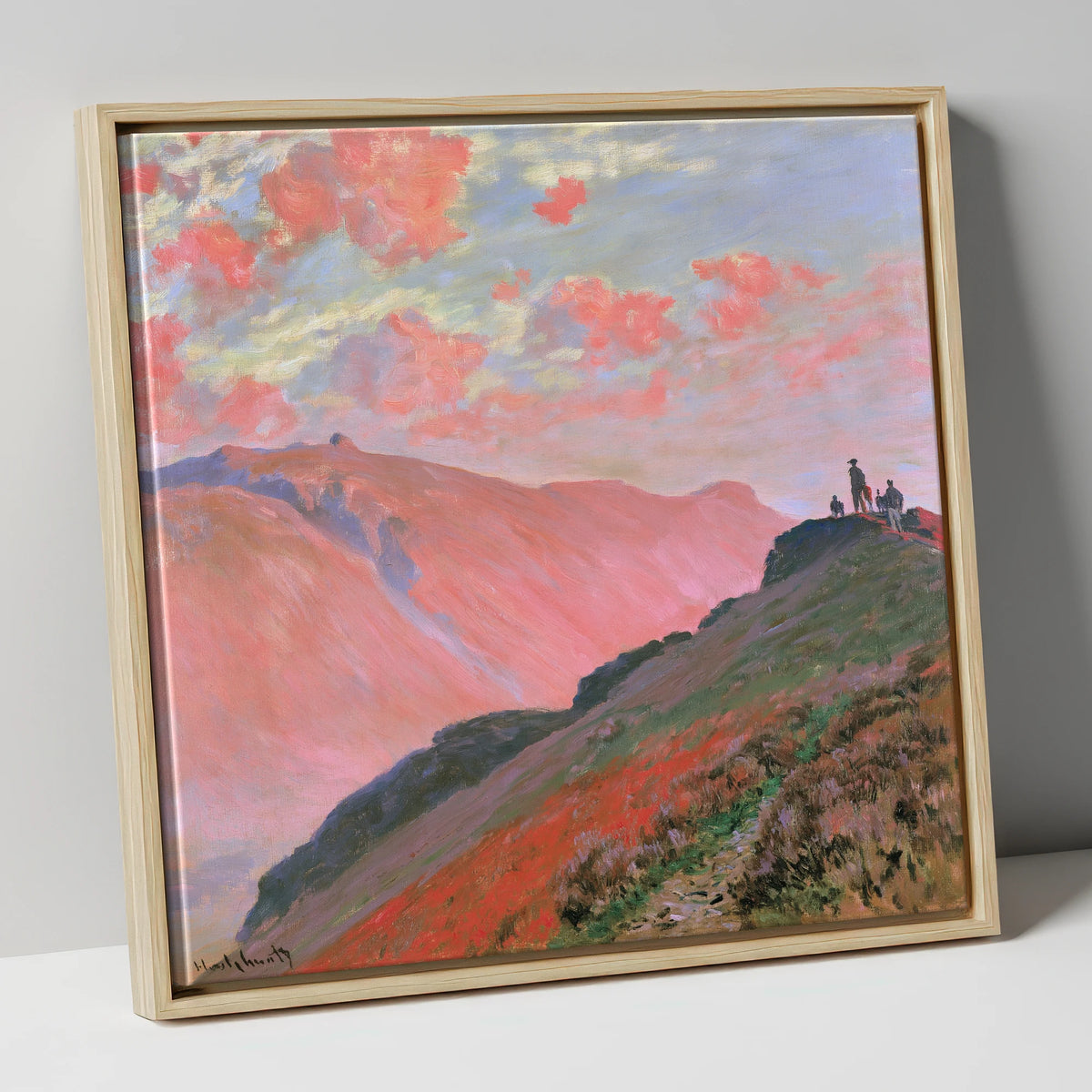 Hikers on a Pink Sunset Fell lake district fell canvas wall art in natural frame