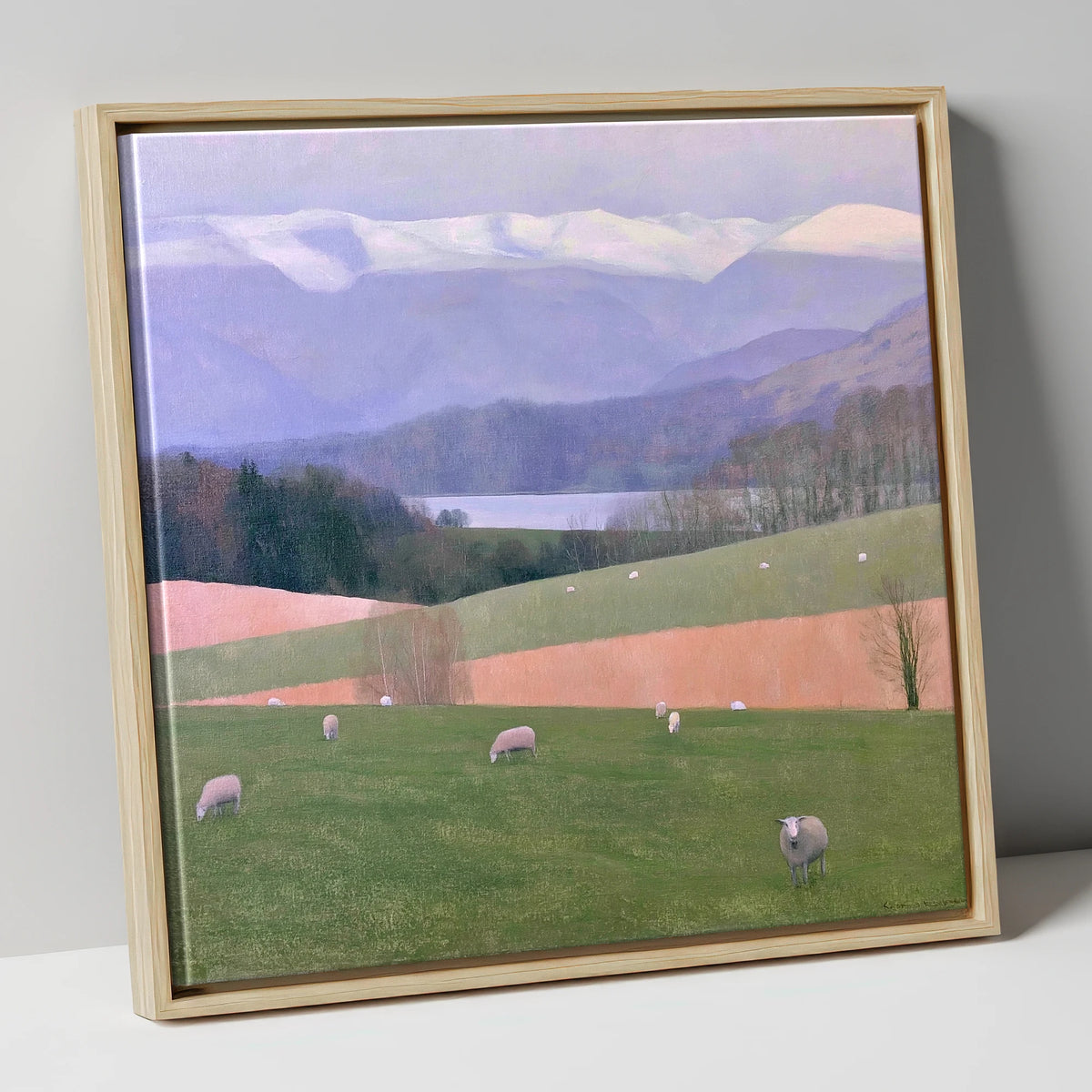 Hawkshead Pastures and Snowy Fells lake district village canvas wall art in natural frame