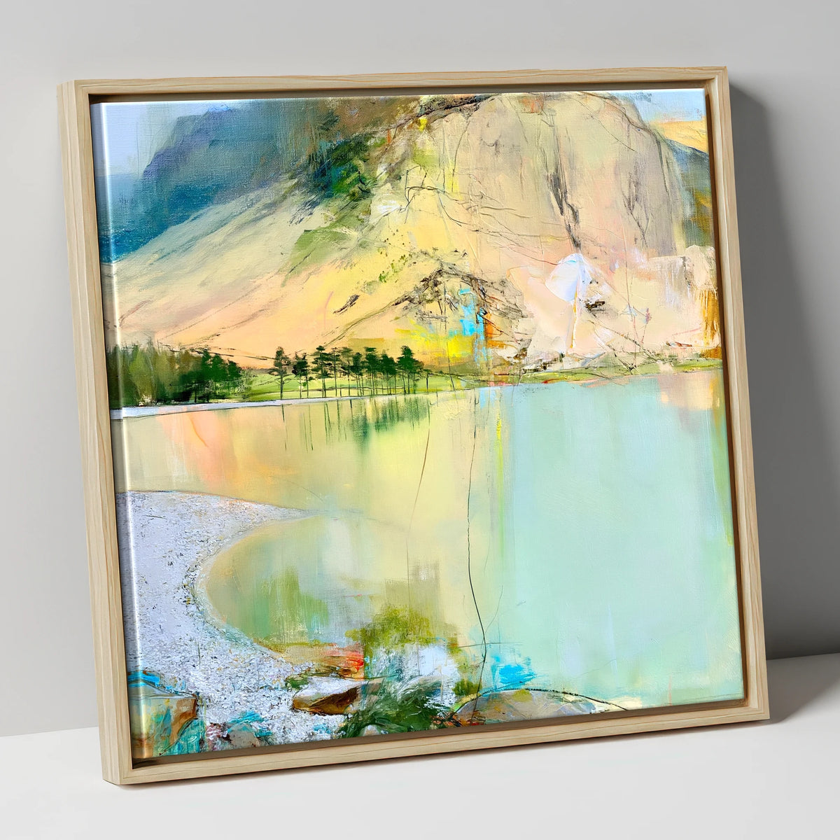 Curving Pebble Shore at Buttermere lake district lake canvas wall art in natural frame