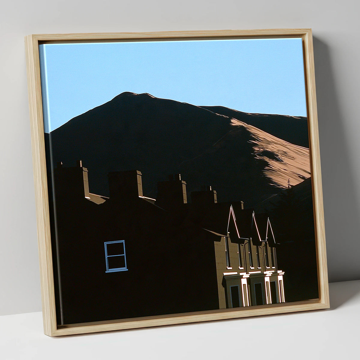Silhouetted Keswick Terraces Beneath Skiddaw lake district village canvas wall art in natural frame
