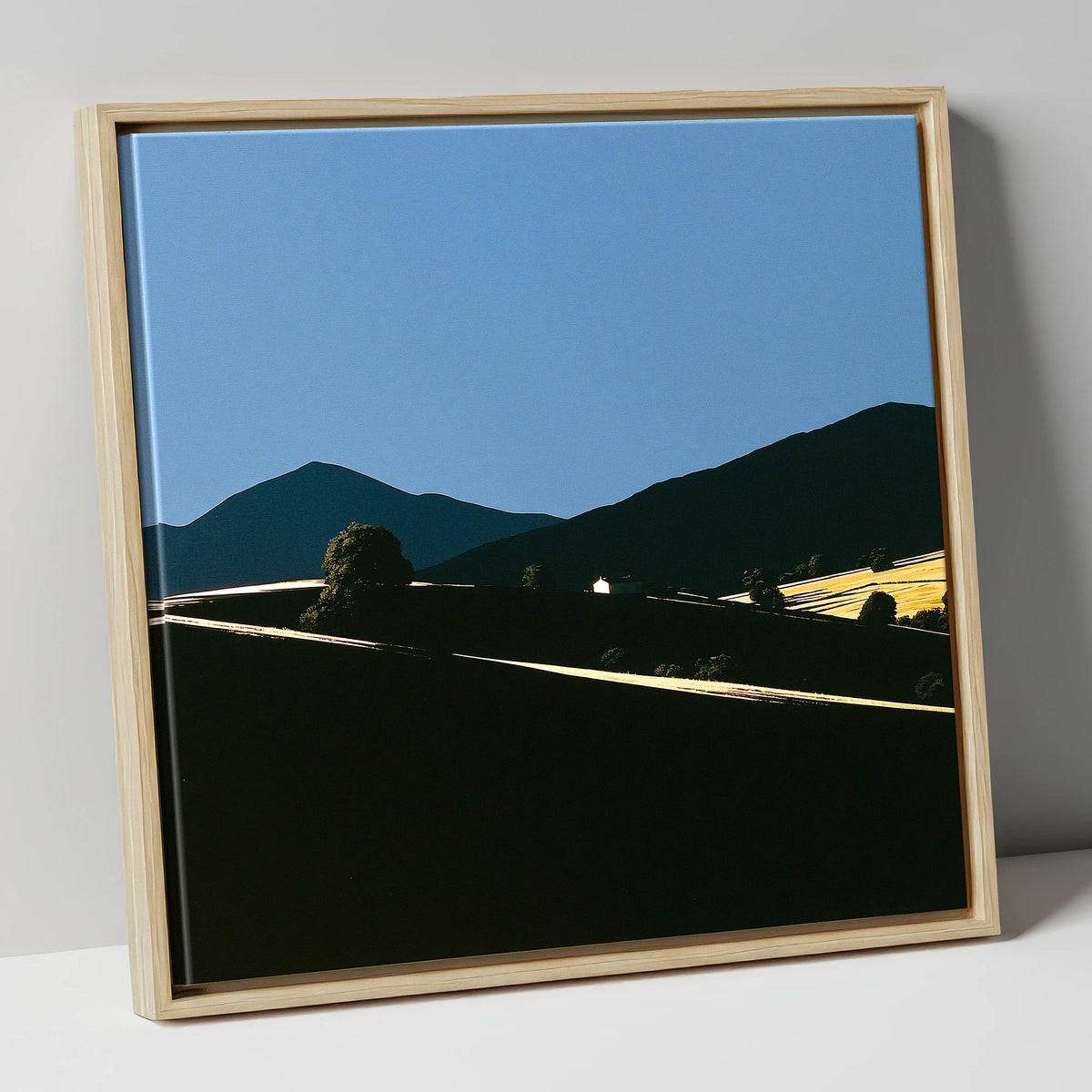 Golden Light on Silhouetted Fells lake district sky canvas wall art in natural frame