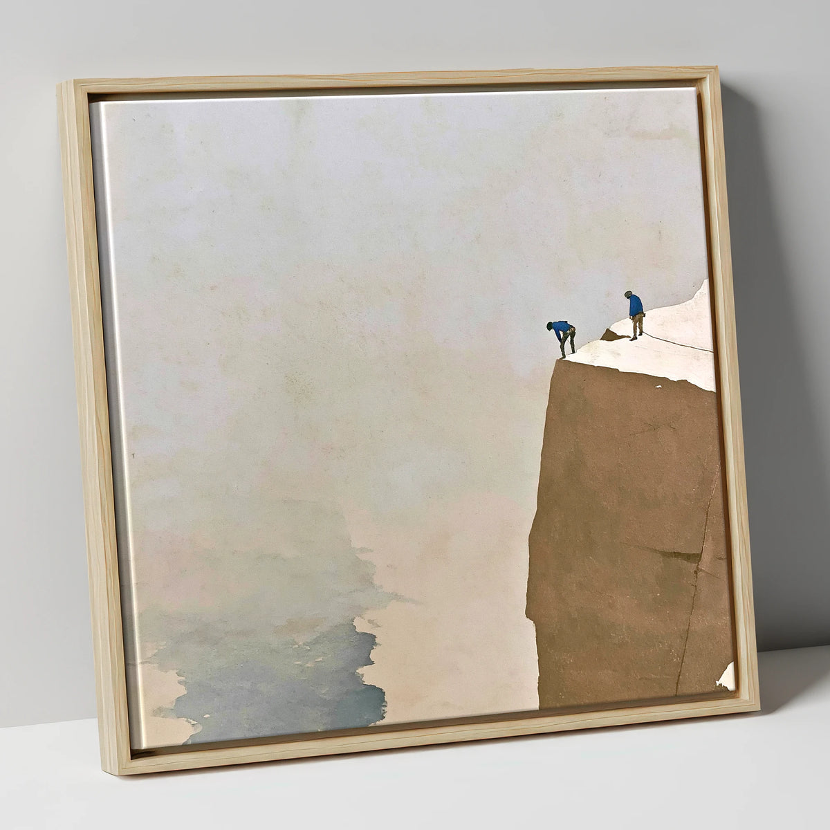Climbers on a Snowy Crag lake district walking canvas wall art in natural frame