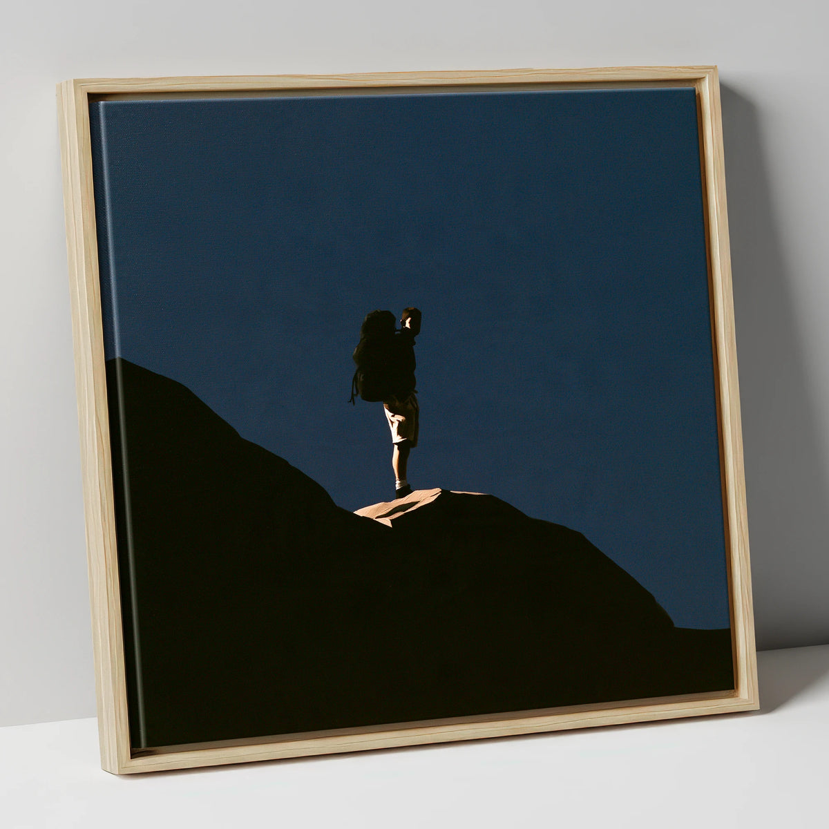 Hiker Silhouette on Dark Fell lake district walking canvas wall art in natural frame