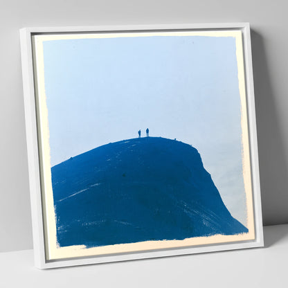 Hikers on a Blue Fell Top lake district fell canvas wall art in white frame