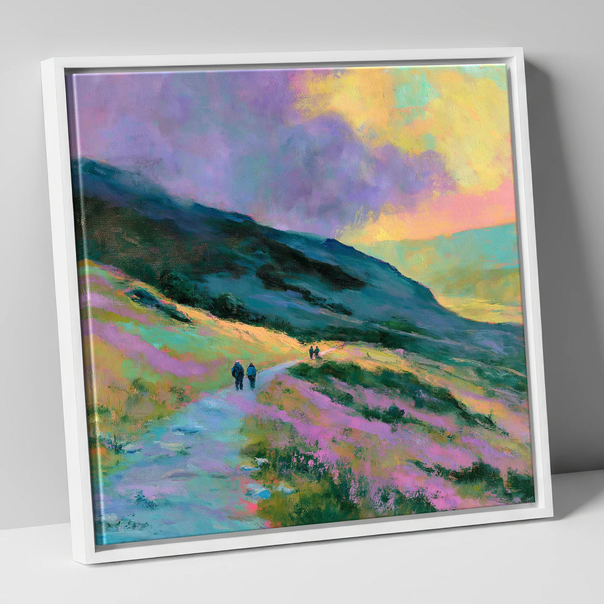 Walkers on Pastel Mountain Path lake district walking canvas wall art in white frame