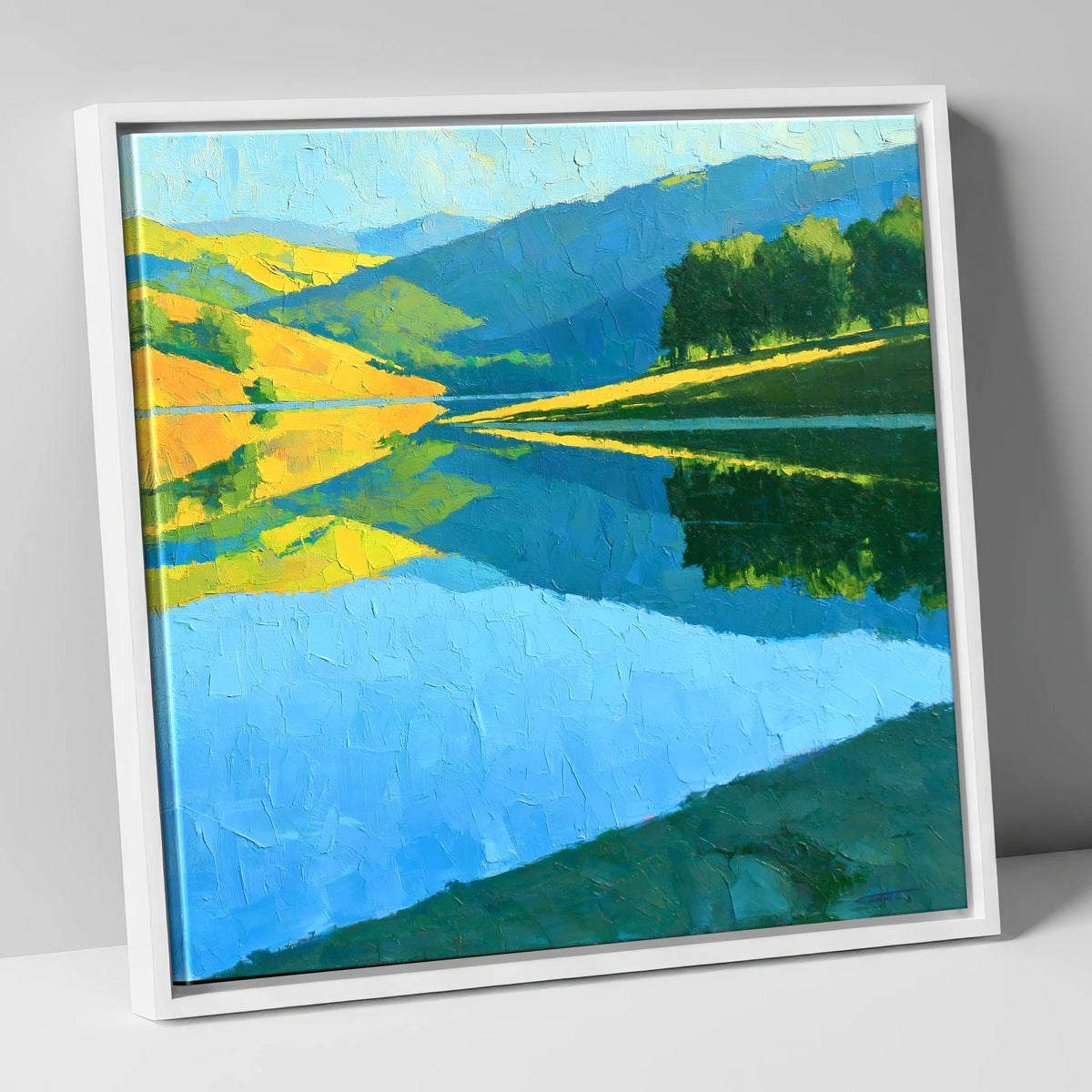 Sunlit Fells Mirrored in Blue Water lake district lake canvas wall art in white frame
