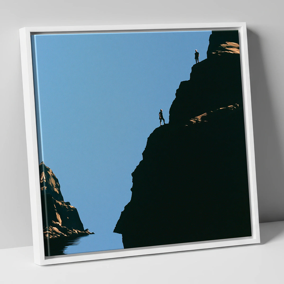 Silhouetted Climbers on Lakeland Crag lake district walking canvas wall art in white frame