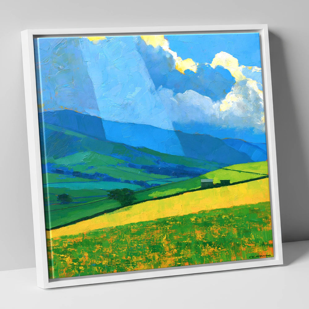 Sunlit Yellow Fields and Stormy Fells lake district sky canvas wall art in white frame
