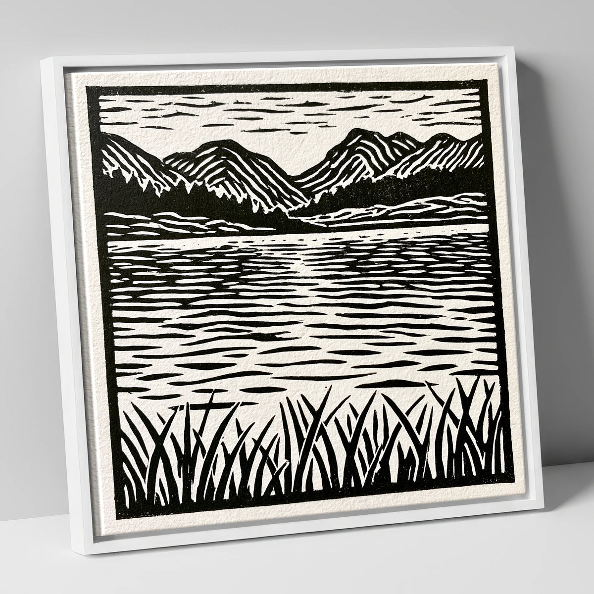 Calm Lake Reflections in Monochrome lake district lake canvas wall art in white frame