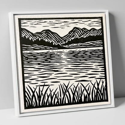 Calm Lake Reflections in Monochrome lake district lake canvas wall art in white frame