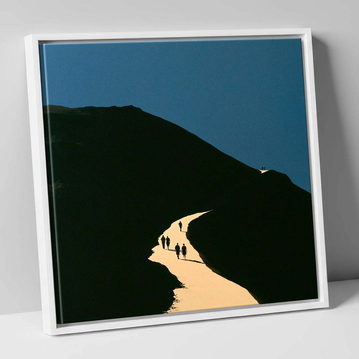 Walkers Ascending Luminous Fell Path lake district walking canvas wall art in white frame