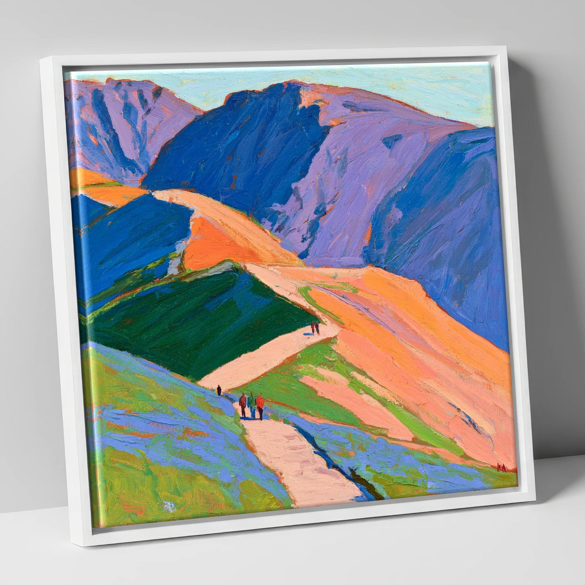 Walkers on Vibrant Mountain Path lake district walking canvas wall art in white frame