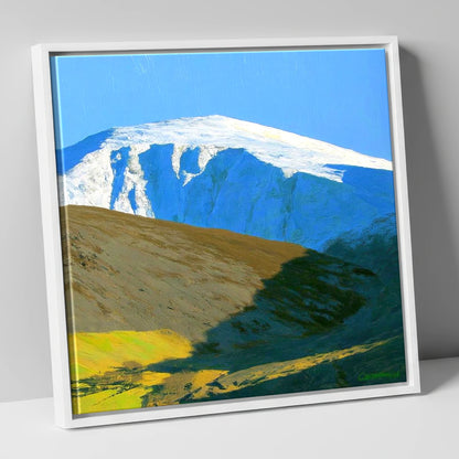 Sunlight on Snow Capped Raise lake district fell canvas wall art in white frame