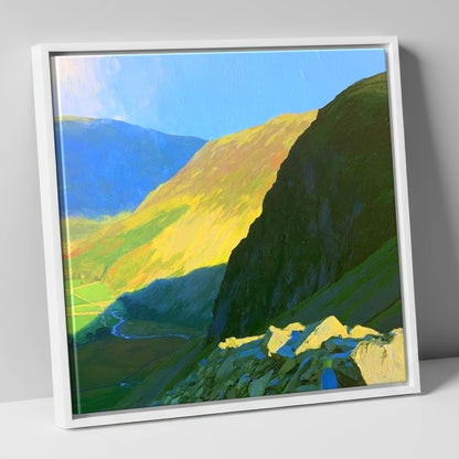 Sunlit Tarn Crag and Valley lake district fell canvas wall art in white frame