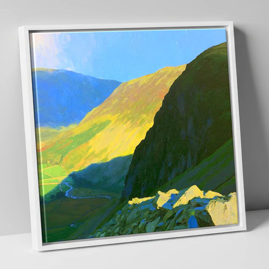 Sunlit Tarn Crag and Valley lake district fell canvas wall art in white frame