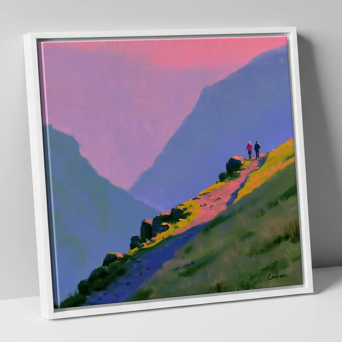 Walkers on a Vivid Mountain Path lake district walking canvas wall art in white frame